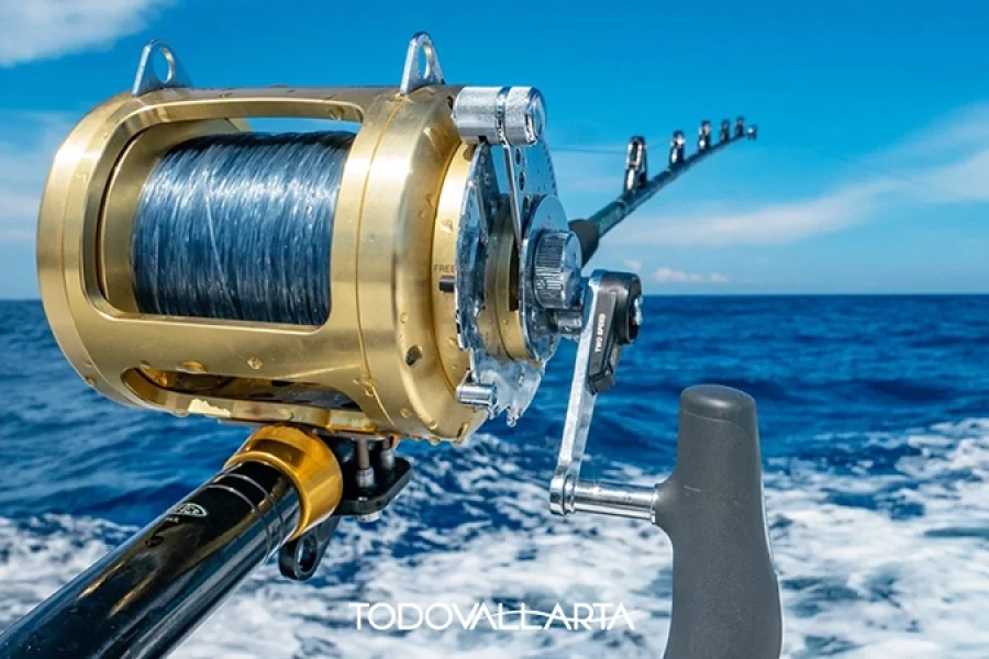 A close-up of a professional fishing reel set up for a deep-sea fishing trip in Puerto Vallarta.