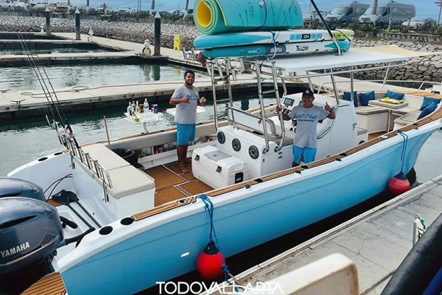 Crew members preparing Ally Cat 3, a 34-foot boat, at the dock in Nayarit.