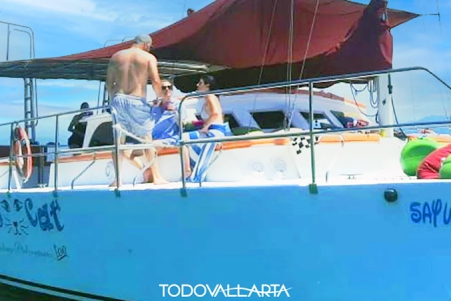 Nayarit Trimaran Catamaran charter 48 Foot Ally Cat Too with guests on deck at sea.