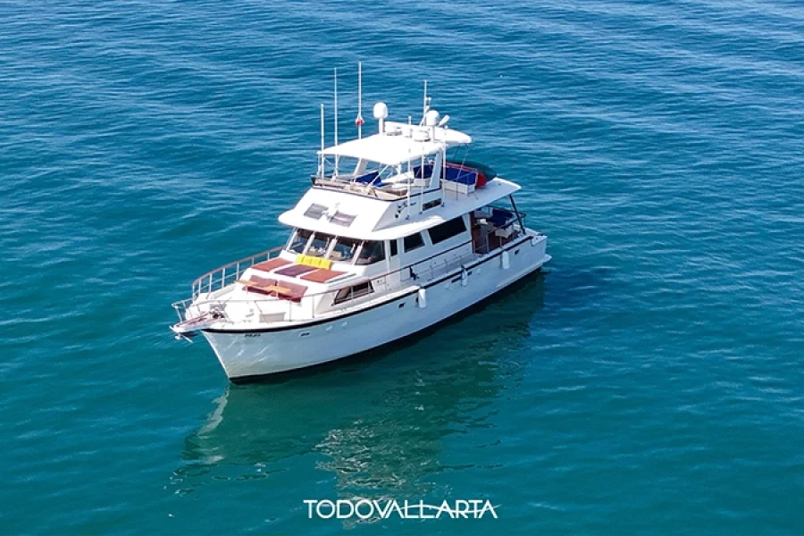 Side deck of the Mer Sea yacht, cruising along Puerto Vallarta’s coastline with views of the blue ocean.