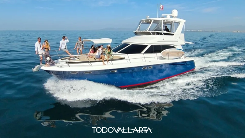 A group of friends relaxing on the deck of a luxury yacht cruising through the waters of Puerto Vallarta.