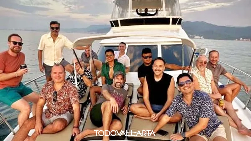 A diverse group of friends seated and smiling on the yacht during the LGBT Sunset Cruise