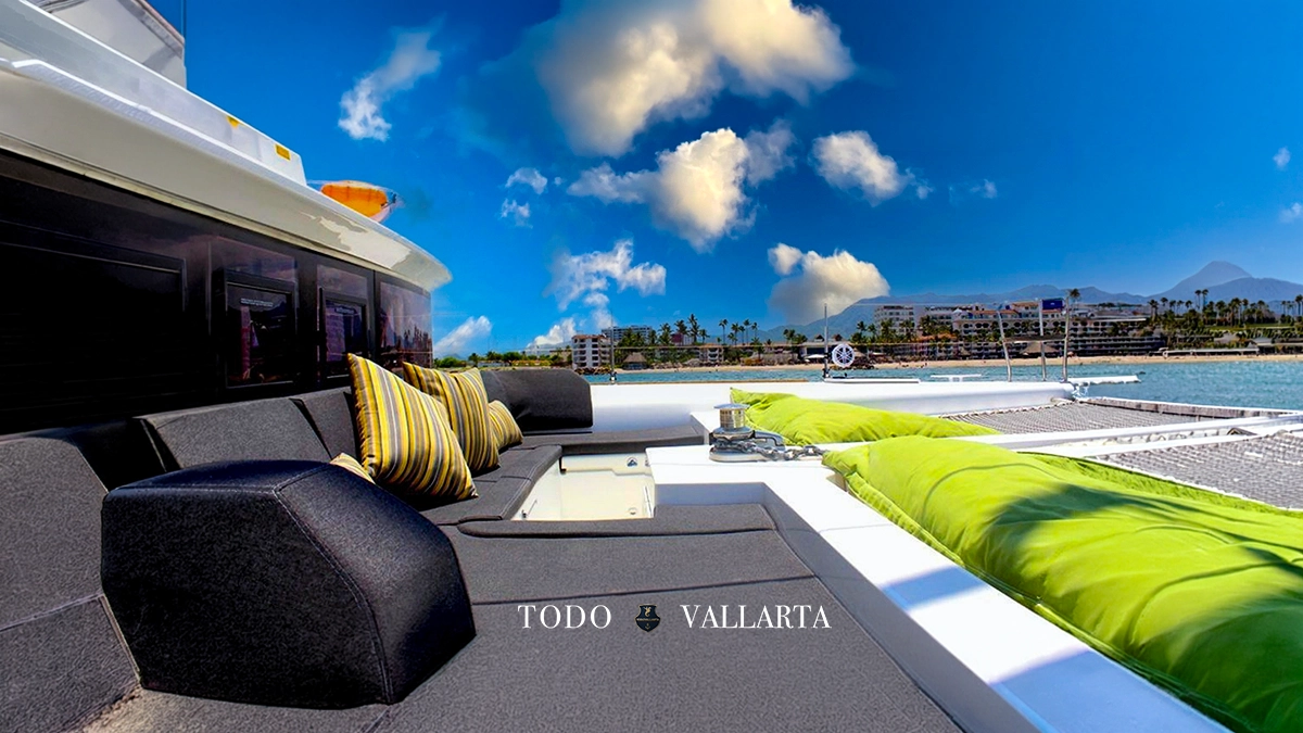 catamaran charter lagoon 45 forward sun pad and netted trampoline with lime-green cushions