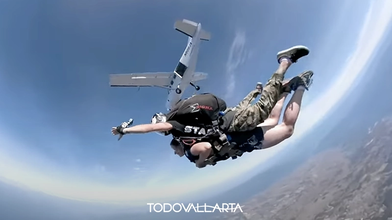 Skydiving pose with airplane in background