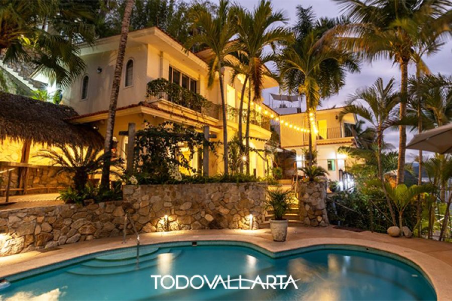 Modern beachfront villa for sale in Puerto Vallarta with ocean views and infinity pool.