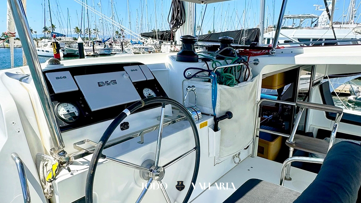 charter goa - 42Ft luxury catamaran helm station with B&G navigation instruments and stainless-steel steering wheel
